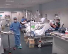 Больницы переполнены больными китайским вирусом, врач бьет тревогу: "Койка умершего пустовала полчаса"