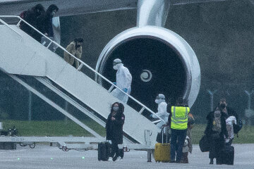 Коронавірус, евакуація, літак, аеропорт, Getty Images