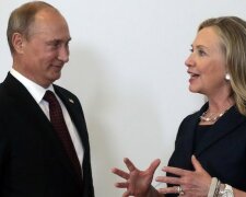 Russia’s President Vladimir Putin meets U.S. Secretary of State Hillary Clinton upon her arriv