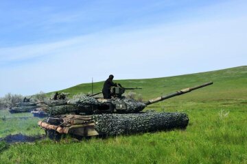 Каждый выстрел в цель: впечатляющие фото учений украинских танкистов