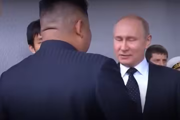 Путін та Кім