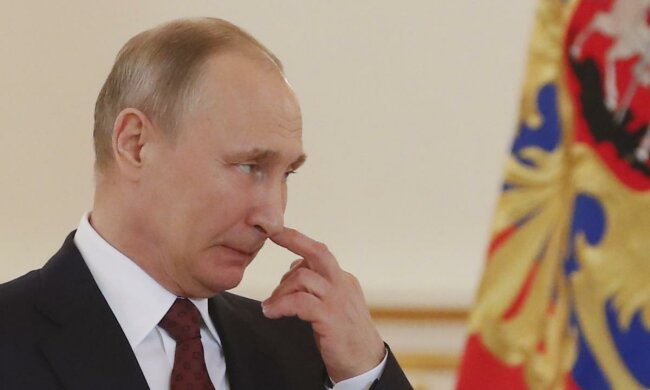 Путин