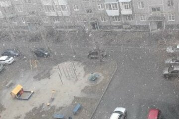 Сніг накрив Київ посеред весни: кадри раптової стихії