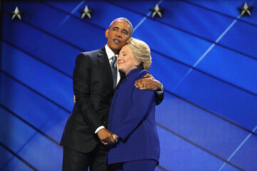PHILADELPHIA, PA - JULY 27:  US President Barack Obama and Democratic presidential candidate Hillary Clinton embrace on the third day of the Democratic National Convention at the Wells Fargo Center, July 27, 2016 in Philadelphia, Pennsylvania. Democratic presidential candidate Hillary Clinton received the number of votes needed to secure the party's nomination. An estimated 50,000 people are expected in Philadelphia, including hundreds of protesters and members of the media. The four-day Democratic National Convention kicked off July 25.  (Photo by Joe Raedle/Getty Images)