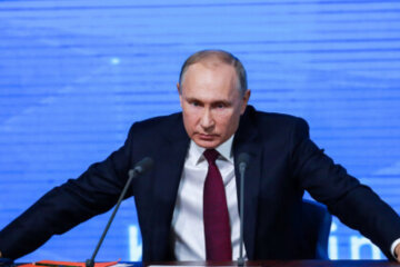 путін