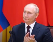 Путін