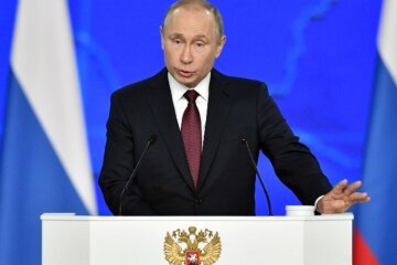 путін