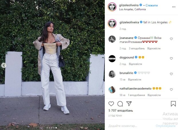 Жгучая брюнетка из Victoria’s Secret распахнула пиджак, посветив упругими формами: «Королевский взгляд!»