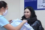 "Услышала выстрел по телефону": украинка потеряла любимого на Донбассе, но выносила под сердцем его сына