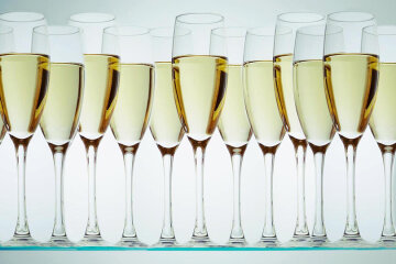 Champagne flutes in a row