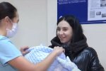 "Услышала выстрел по телефону": украинка потеряла любимого на Донбассе, но выносила под сердцем его сына