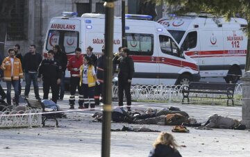 Rescue teams gather at the scene after an explosion in central Istanbul