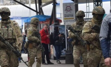 Остановка транспорта и проверка граждан: на улицах Киева люди с оружием, в СБУ сделали срочное заявление
