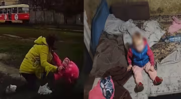 П'яна мати з малятком перетинала жваву дорогу, кадри: "впала на землю спиною"