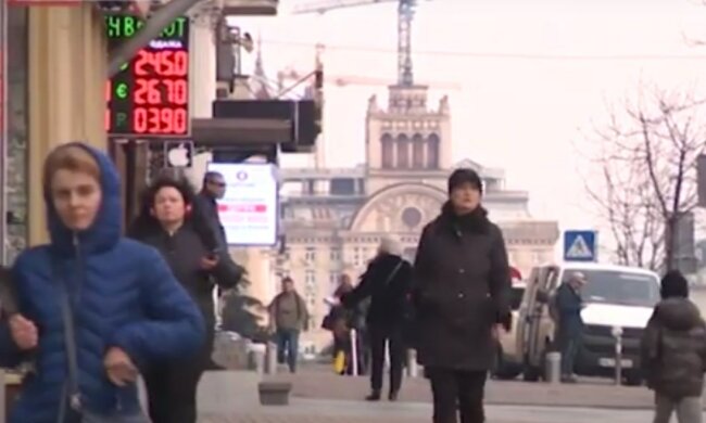 обмін валют курс долара гривня люди українці