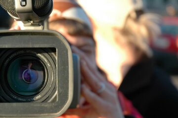 видеокамера журналист