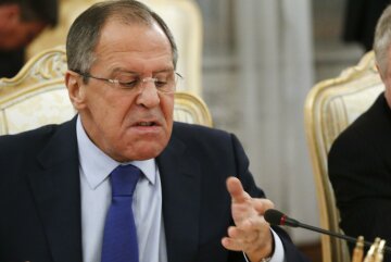 Russia’s Foreign Minister Lavrov reacts during a meeting with his German counterpart Steinmeie