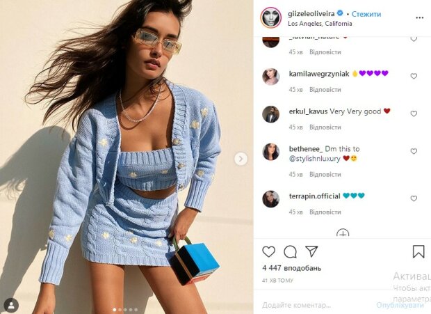 Знойная брюнетка из Victoria’s Secret пленила загоревшим телом в вязаном мини: «Чертовски мило»