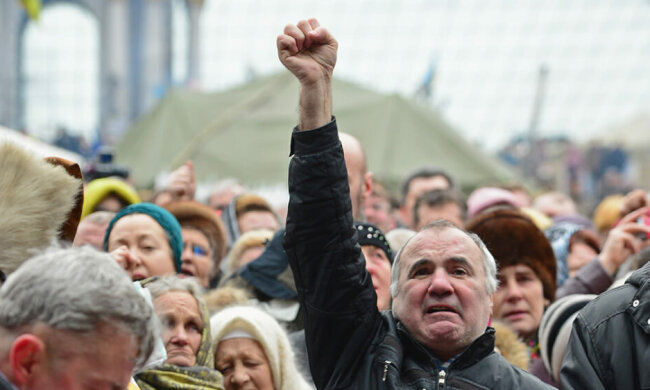 Arrest Warrant Issued For Former Ukrainian Leader As Square Becomes Shrine To Dead