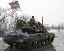 Members of the armed forces of the separatist self-proclaimed Donetsk People’s Republic drive 
