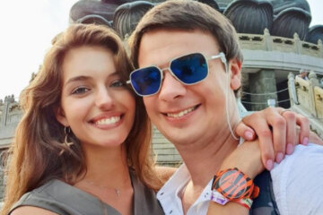 Олександра Кучеренко, Дмитро Комаров