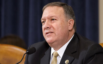 FILE - In this Oct. 22, 2015, file photo, House Benghazi Committee member Rep. Mike Pompeo, R-Kan., questions Democratic presidential candidate Hillary Clinton, during the committee's hearing on Capitol Hill in Washington. Pompeo on Monday, April 4, 2016, accused fellow Republican U.S. Sen. Jerry Moran of saying one thing in Kansas and another in Washington about filling a vacancy on the Supreme Court, prompting speculation that the House member could be planning a primary challenge against the incumbent senator. (AP Photo/Jacquelyn Martin, File)