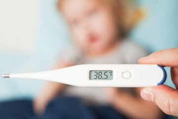 температура