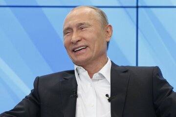 Путин