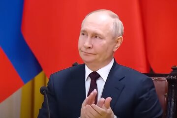 Путін