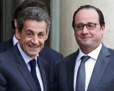 File photo of French President Hollande who stands with Sarkozy, former president and current head o