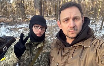 Валерий Харчишин с сыном, скриншот YouTube