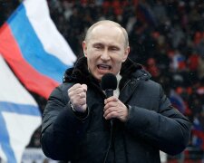 Presidential candidate and Russia’s current Prime Minister Putin delivers a speech during a ra