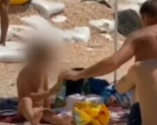 Ребенку дали выпить пиво посреди пляжа в Кирилловке: возмутительное видео
