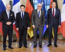 Foreign Ministers Fabius, Klimkin, Steinmeier and Lavrov pose for a group photo in Berlin