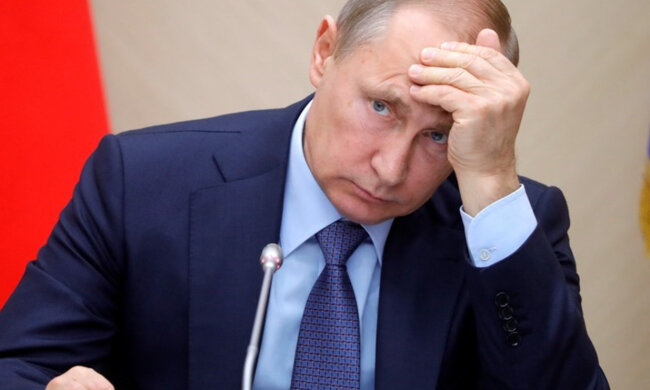путін