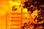 В Киеве загорелся жилой дом, из огня вытащили человека: кадры масштабного ЧП