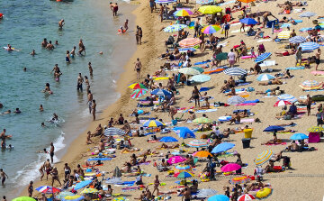 Tourists Enjoy Spain’s Costa Brava As The Country Steers Towards A Full-Scale Bailout