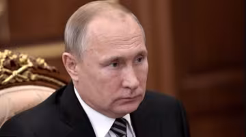 путін