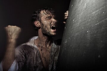 Dirtyand handsome man in despair