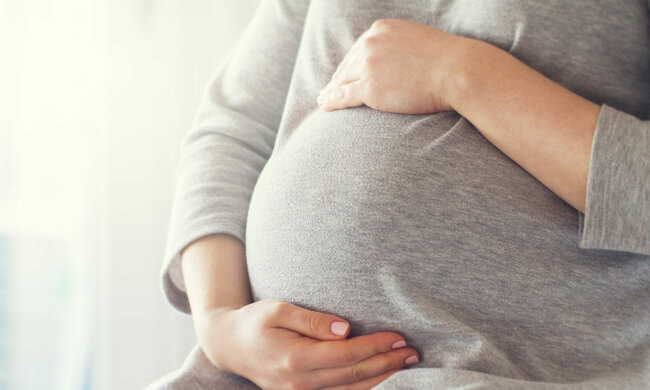 Беременная