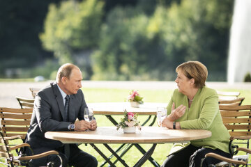 Путін і Меркель