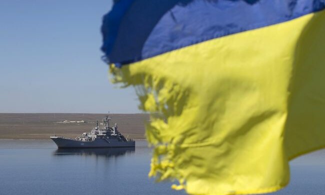 A Ukrainian flag placed by a family member of a sailor on board the Ukrainian naval landing vessel &