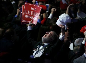 A Trump supporter celebrates as election returns come in at Republican U.S. presidential nominee Donald Trump's election night rally in Manhattan, New York, U.S., November 8, 2016.   REUTERS/Jonathan Ernst