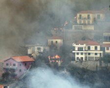 View of Sitio de Curral dos Romeiros during the wildfires at Funchal, Madeira island
