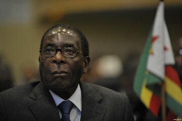 Robert Gabriel Mugabe, president of the Republic of Zimbabwe, sits in the Plenary Hall of the United