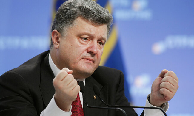 Ukraine’s President Petro Poroshenko speaks to the media during a news conference in Kiev