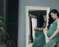 depositphotos_169251086-stock-video-beautiful-pregnant-woman-standing-near