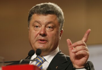 Ukrainian businessman, politician and presidential candidate Poroshenko gestures as he speaks to sup