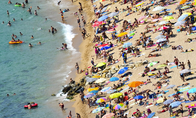 Tourists Enjoy Spain’s Costa Brava As The Country Steers Towards A Full-Scale Bailout