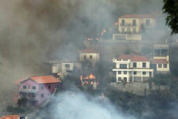 View of Sitio de Curral dos Romeiros during the wildfires at Funchal, Madeira island